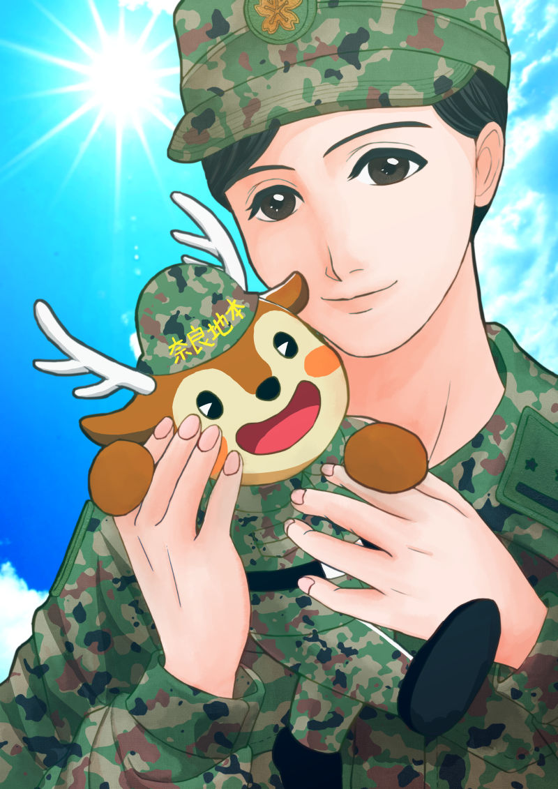 文字なし。女性自衛官とりくしかくん（奈良地方協力本部のマスコットキャラクター）